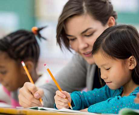 Woman Tutoring Child
