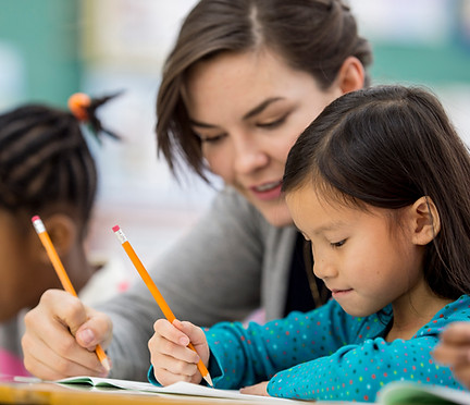 Woman Tutoring Child