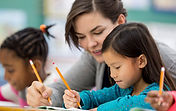 Woman Tutoring Child