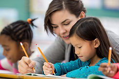 Teacher Assisting Students