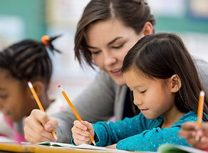 Teacher Assisting Students