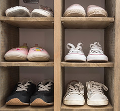 Kids Shoes in Cupboard