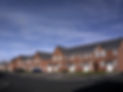 Modern new build street scene of terrace houses in the UK