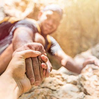 Person offering their hand to someone