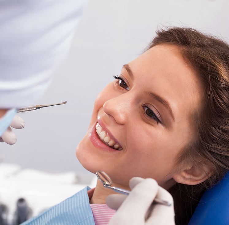 smiling patient during dental check-up