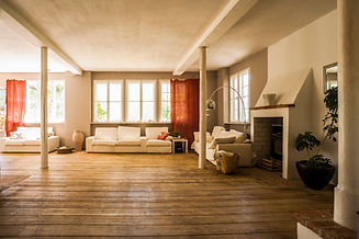 Spacious living room with wooden floor