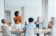 Team Applauding Leader
