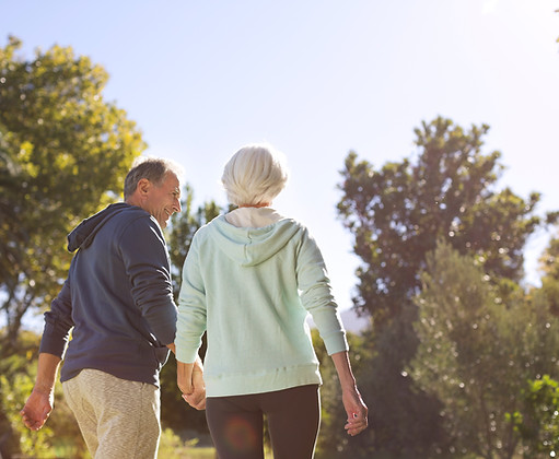 Senior couple walking outdoors