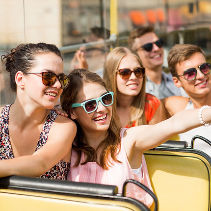 Tour group on open bus