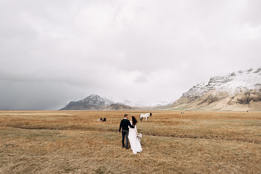 Couple in mountain field