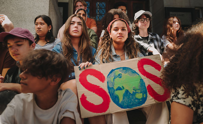 Group holding SOS sign