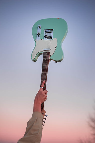 Guitar Held High