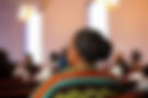 Woman in Church Pews