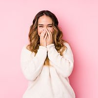 Smiling in Sweater