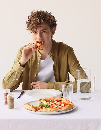 Man Eating Pizza