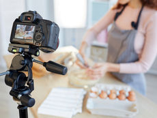 Wellness entrepreneur using AI tools to create personalised content for digital marketing