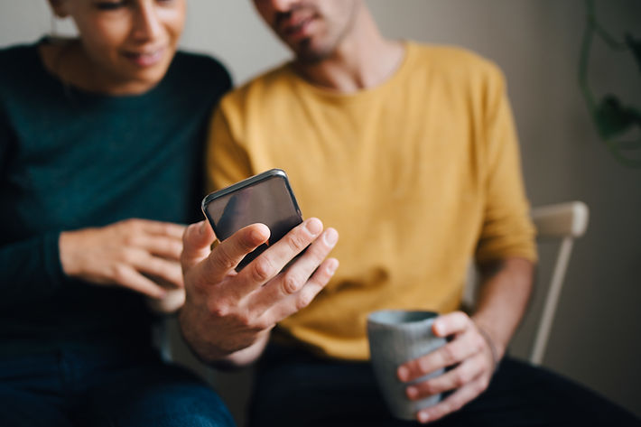 Couple Using Smartphone