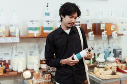 A man choosing soap and organic products