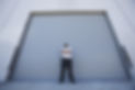 Security guard standing with arms crossed