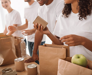 Volunteers Packing Food