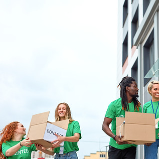 Volunteers with Donation Boxes
