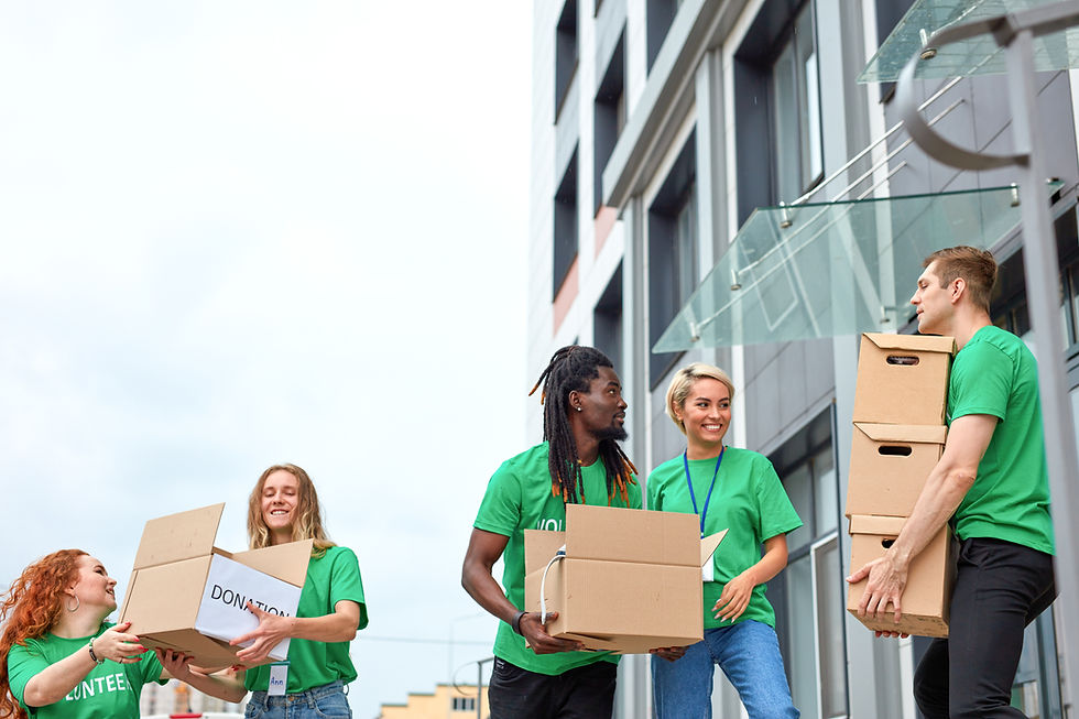 Volunteers with donation boxes