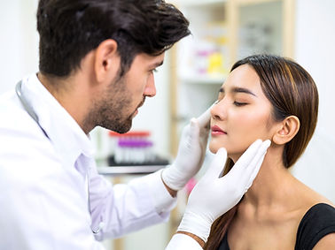Doctor Examining Face