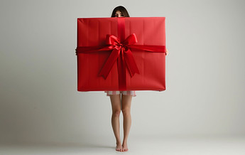 Woman With Large Gift