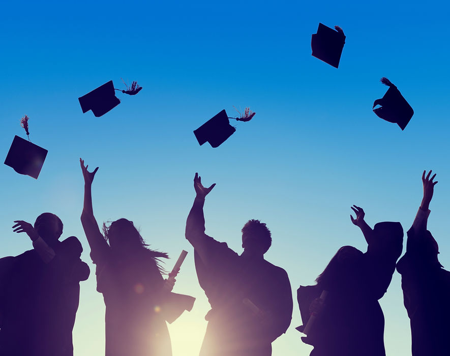 Graduates Tossing Caps