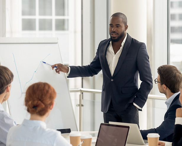 Manufacturing leadership team collaborating on talent strategy and succession planning initiatives