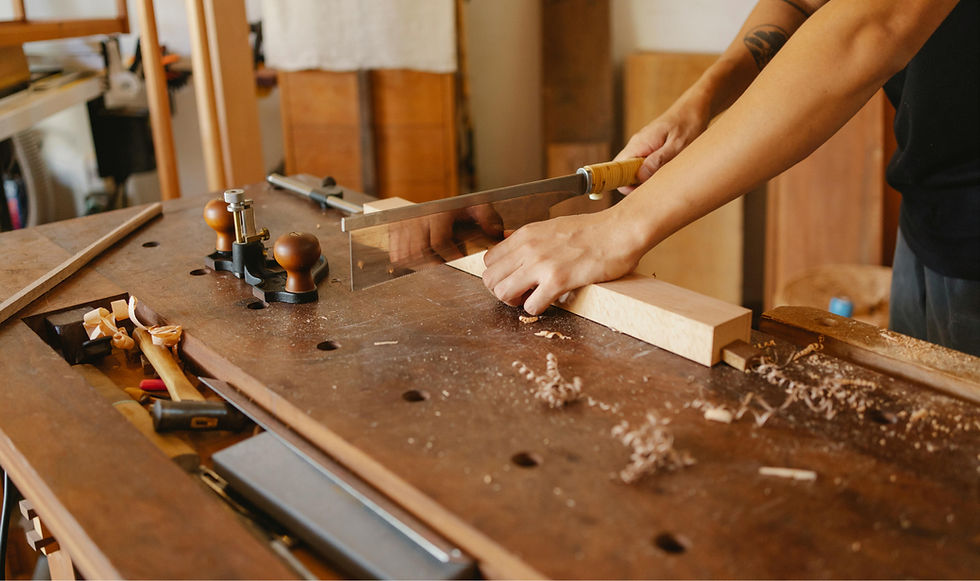 Carpenter Sawing Wood