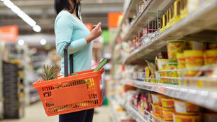 Supermarket customer with basket
