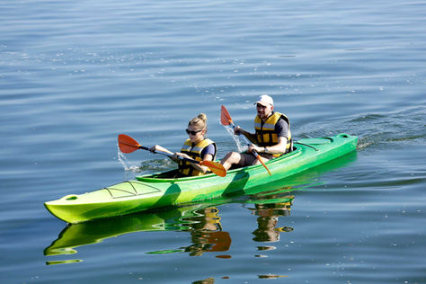 Couple kayaking on Touw River in Wilderness