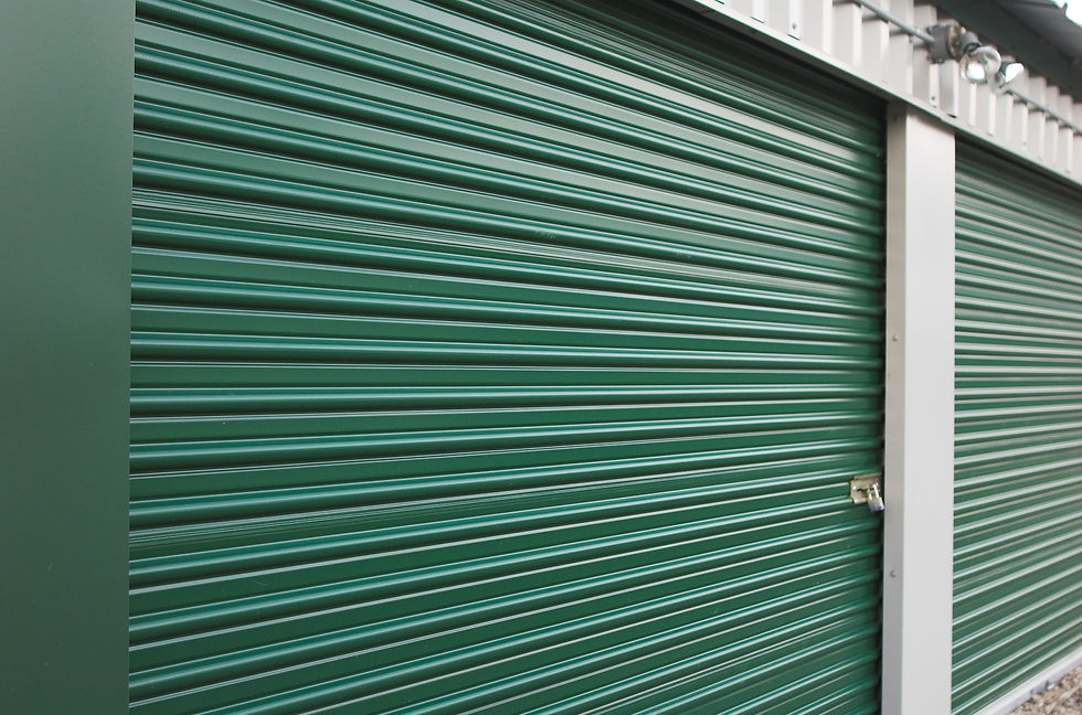 Green corrugated metal shutter with horizontal ridges