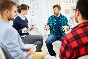 College Students Group Discussion In Class