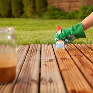 Painting wooden patio deck with protective varnish