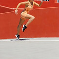 Woman Sprinting Outdoors
