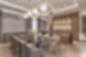 A dining room area with an open kitchen and modern ceiling lights