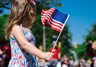 Girl Holding US Flag