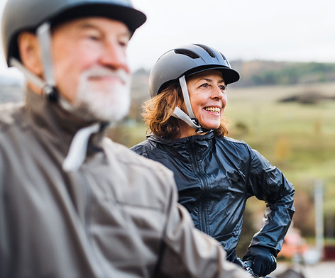 Happy Couple Riding Bikes