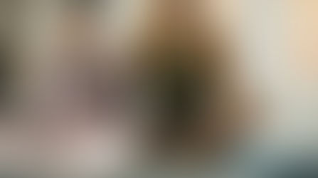 Older couple meditating indoors