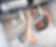 Plumber fixing pipes in the kitchen