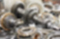 Close-up of automobile engine steel gears and bearings disassembled for repair at car serv