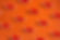 Slices of Seville oranges on an ornage background