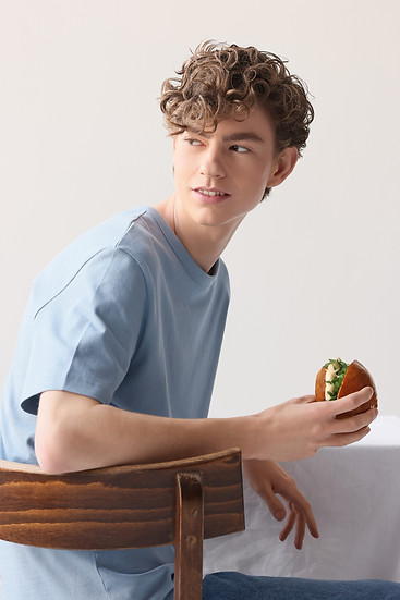Holding a Hamburger