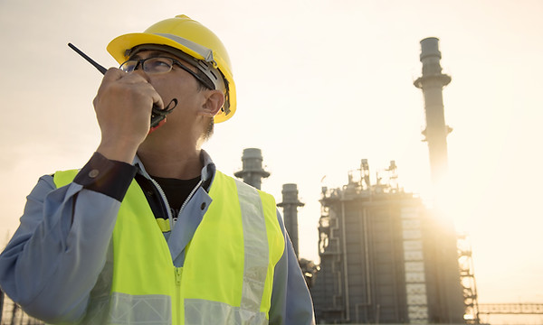 Engineer Talking Through Walkie Talkie