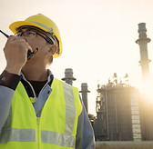 Engineer Talking Through Walkie Talkie