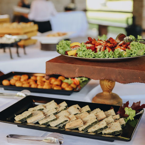 Delicious wedding buffet: shrimp, pastries, and sandwiches