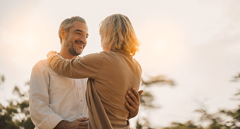 Couple embracing and smiling
