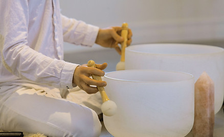 Playing-Crystal-Singing-Bowls